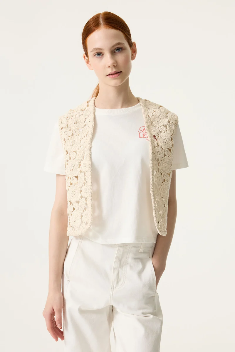 Gebrochenes weißes Gilet